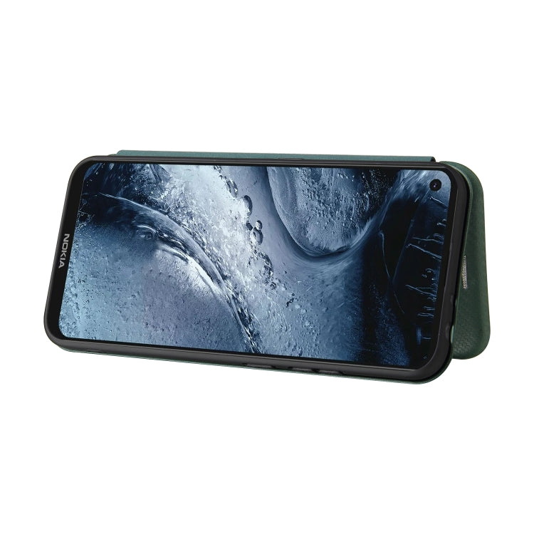 Para Nokia 7.3 Textura de fibra de carbono Magnético Horizontal Flip TPU + PC + Funda de cuero PU con ranura para tarjeta (verde)