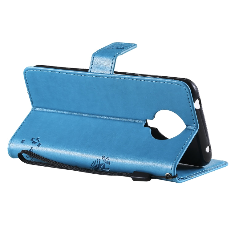 Para Nokia G10 Árbol y gato Patrón de impresión prensado Funda de cuero PU de la PU con soporte y tragamonedas y billetera y cordón (azul)