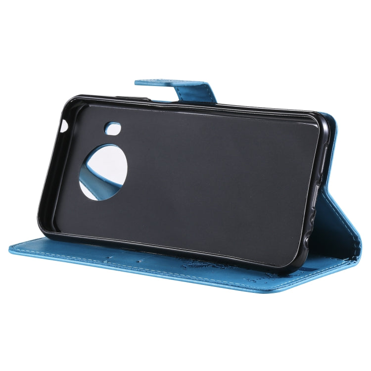 Para Nokia X10 Árbol y gato Patrón de impresión prensado Funda de cuero PU de la PU con soporte y ranuras para tarjetas y cordón (azul)