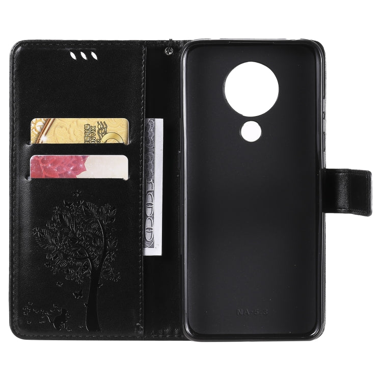 Para Nokia 5.3 Patrón de árbol y gato Impresión prensada Funda de cuero Horizontal Flip PU con soporte y tragamonedas y billetera y cordón (negro)
