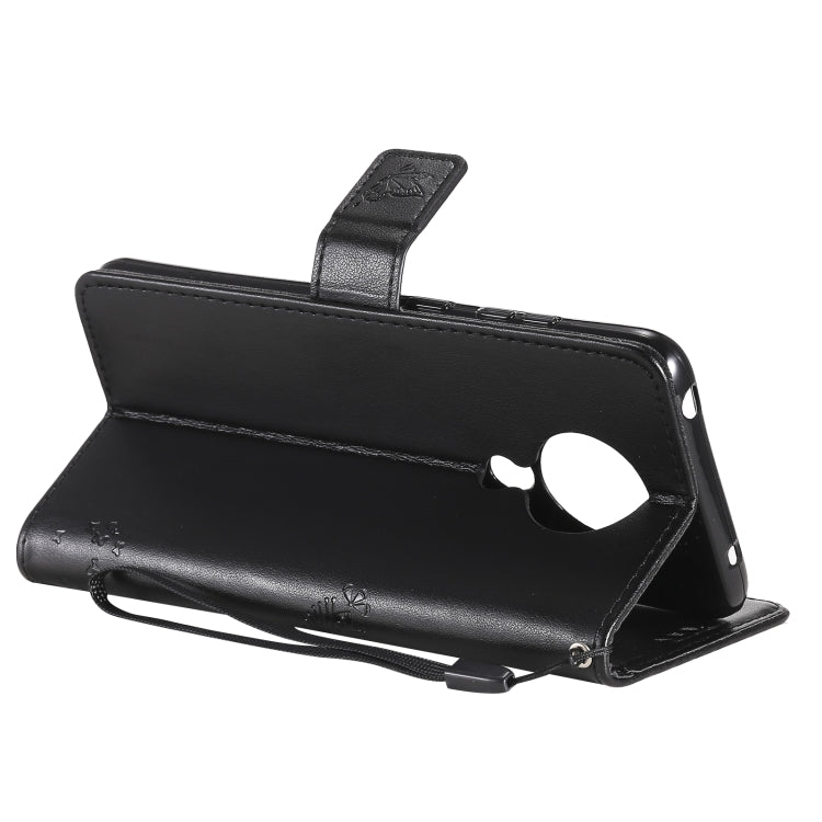 Para Nokia 5.3 Patrón de árbol y gato Impresión prensada Funda de cuero Horizontal Flip PU con soporte y tragamonedas y billetera y cordón (negro)