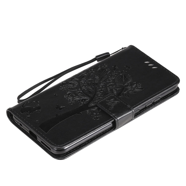 Para Nokia 5.3 Patrón de árbol y gato Impresión prensada Funda de cuero Horizontal Flip PU con soporte y tragamonedas y billetera y cordón (negro)