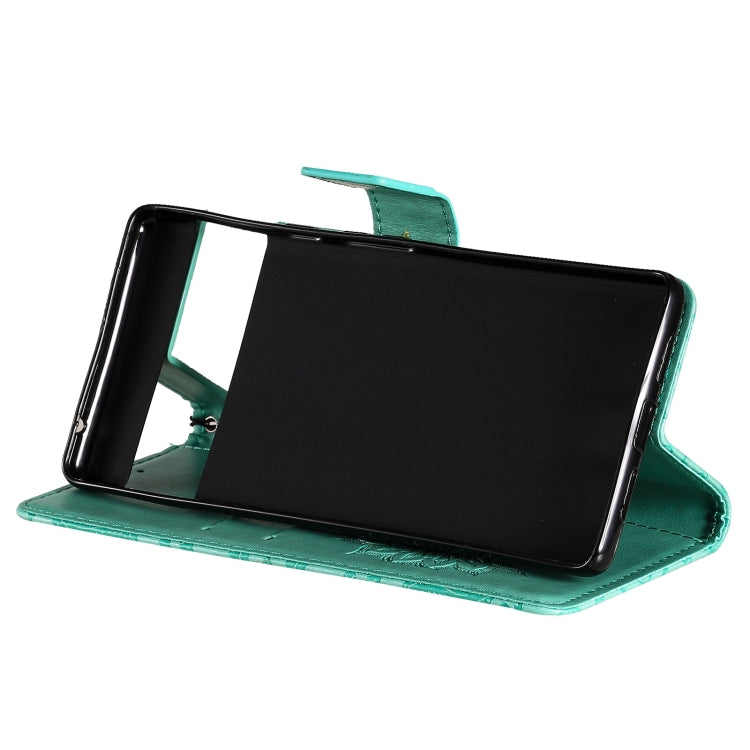 Para Google Pixel 6 Sun Pattern Horizontal Flip Funda de cuero con ranura para tarjeta y soporte y billetera y cordón (verde)