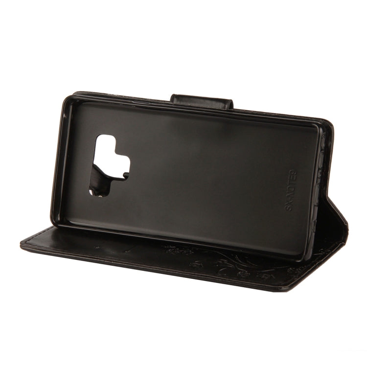 Estuche de cuero con tapa horizontal con patrón de mariposa en relieve con ranura para tarjeta, soporte, billetera y cordón para Galaxy Note9 (negro)