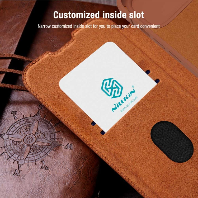 Para iPhone 15 Nillkin Qin Series Pro Funda de Cuero con Diseño de Cubierta de Cámara Deslizante (Marrón) - MOVILSTORE